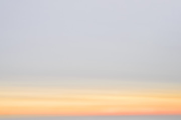 Fototapeta premium background with the gray sky and the sunrise