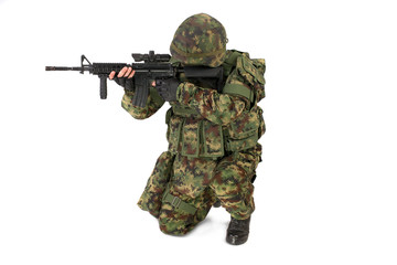 Armed soldier isolated on white background