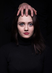 Attractive woman with man's hands