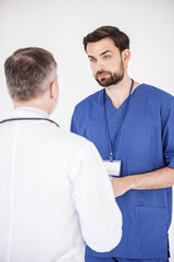 Obraz premium Serene doctors speaking in clinic