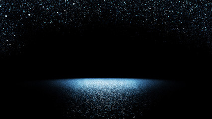 glitter background -
twinkling blue glitter falling on a flat surface lit by a bright spotlight