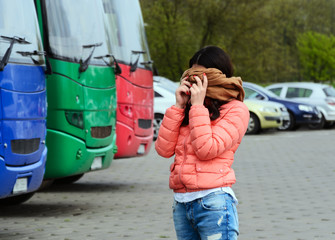 The girl in the parking lot with a blindfold on.