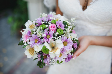 Wedding  bouquet in bride's hands
