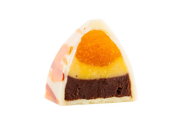 White chocolate candy with ganache and fruit filling