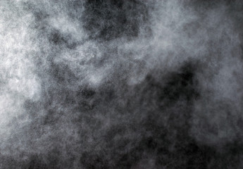 abstract powder explosions isolated on black background.