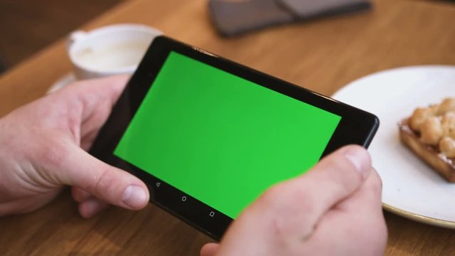 Green screen hands using digital tablet touchscreen device