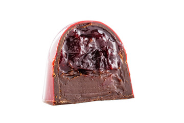 Cut chocolate candy with cherry