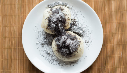 Traditional austrian czech yeast dumpling with poppy-seeds and sugar