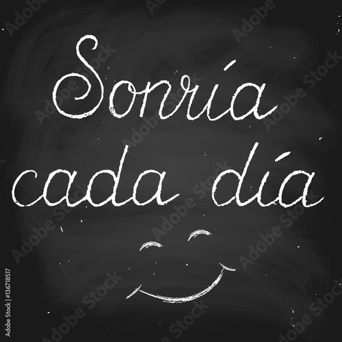 "Phrase in Spanish which means Smile every day. Handwritten text" Stock