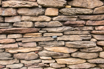 Stone wall fence for use as a background.