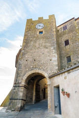 historic tower in the tuscan village of Capalbio, italy