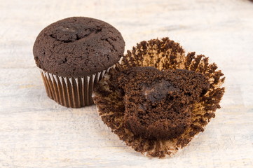 Dark chocolate muffins in paper cups