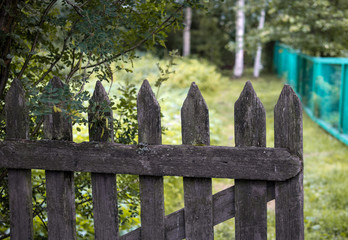 Old wooden fence in the village.