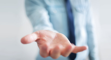 Businessman showing his empty hand
