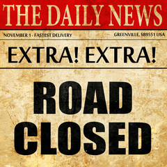 road closed, article text in newspaper