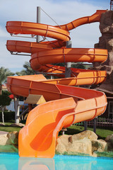 Attraction with a water pipe in the aqua park.