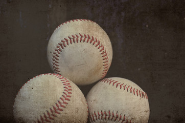 Stack of baseballs with grunge texture.  