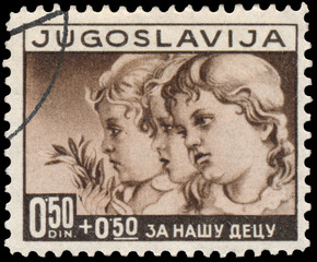 Stamp printed in Yugoslavia shows children