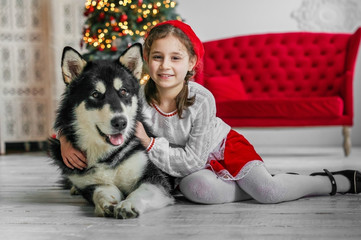 Girl child Little Red Riding Hood costume with a big dog.