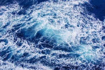 Background blue waves of the sea