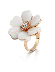 Jewellery ring in shape of flower with nacre isolated on white,