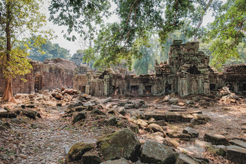 Od ruins of Preah Khan Temple in Siem Reap, Cambodia. Preah Khan has been left largely unrestored, with trees and other vegetation growing among the ruins.