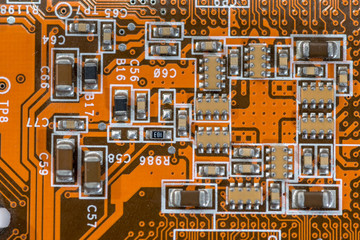Circuit board. Technology and electronics - part of old motherboard close up for texture.