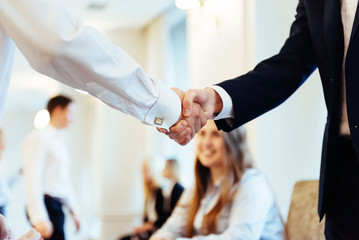 Business men hand shake