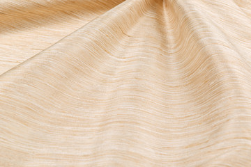 yellow background luxury cloth or wavy folds of grunge silk texture satin velvet