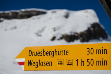 Hiking signpost in swiss mountains