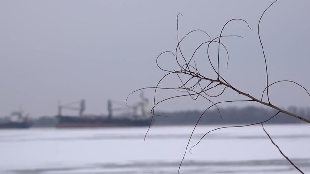 Ice conditions in the port town. Raid parking river fleet.River, ice-breaker, an attempt to cross to the other side.