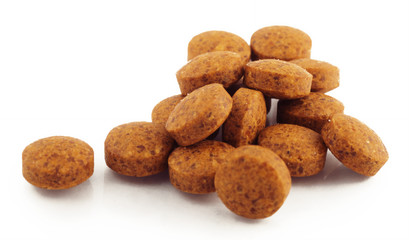 Tablets on plain background