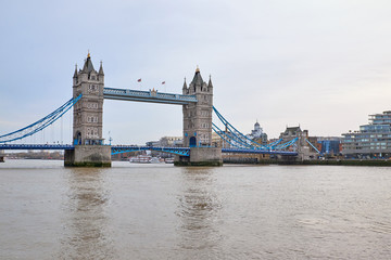 Fototapeta na wymiar LONDON CITY - DECEMBER 24, 2016: Tower Bridge crossing the River Thames seen from the north bank