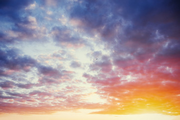 Naklejka na ściany i meble cumulus clouds at sunset