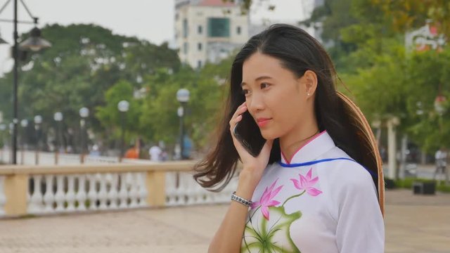 Vietnamese girl talking on the phone