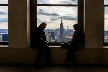 tourists looking to Empire State Building