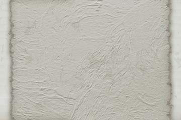 Pattern of white vintage structural plaster and cardboard