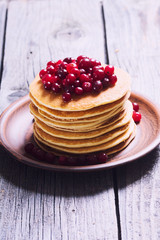 stack of pancakes with cranberries