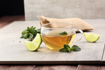 Tea. Herbal tea. Mint leaf. Tea in a glass cup, mint leaves, dri