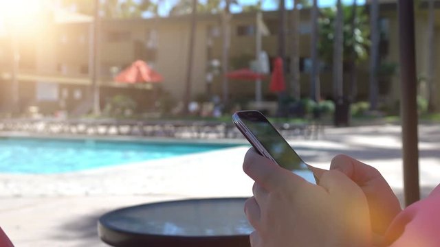 High quality video of woman using mobile phone in 4K