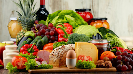 Obraz na płótnie Canvas Organic food including vegetables fruit bread dairy and meat