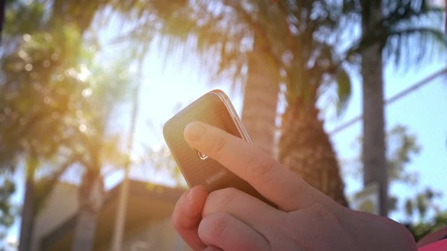 High quality video of woman using mobile phone in 4K