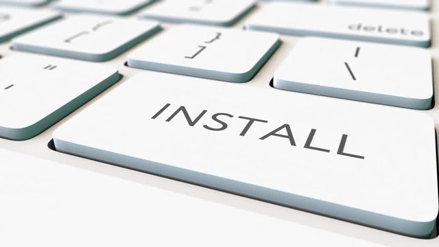 Macro dolly shot of white computer keyboard and install key, shallow focus. Conceptual 4K clip