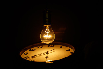 Light bulb and clock