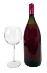 Glass standing next to bottle of corked red wine.