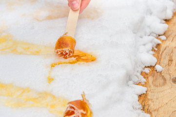 Maple taffy on snow at the sugar shack, in Montreal, Canada (2017)