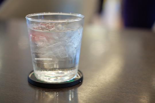 Glass of pure water on table