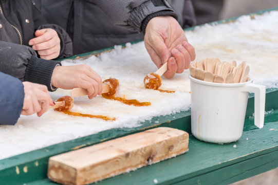Maple taffy on snow at the sugar shack, in Montreal, Canada (2017)
