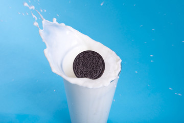 Cookie in splashing milk