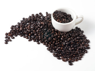 cup and coffee beans on white background
